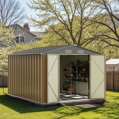 a storage shed with the door open and shelves on it in front of a house