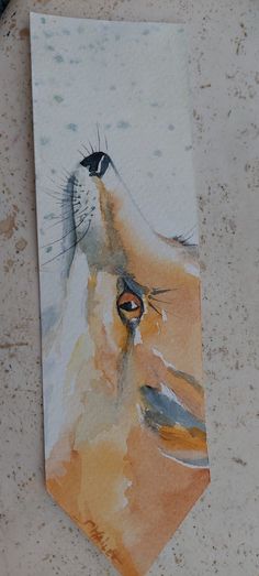 a watercolor painting of a dog's face on a tie