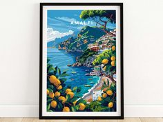 a framed poster with the words amalfi on it in front of a white wall