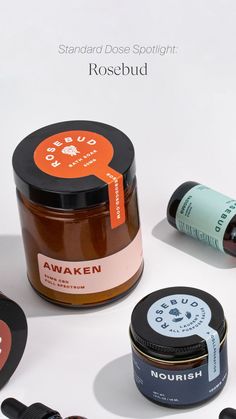 several different types of skin care products on a white surface with the words awake written below them