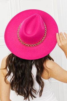 This super trendy felt hat comes in a beautiful fuchsia color that can bring a neutral outfit to life! This hat features a chain detailing and adjustable straps. Type: Fedora hat Pattern type: Contrast Material: 90% polyester, 10% plastic Imported Product measurements: Brim: 3.5 in Interior width: 6.8 in Height: 4 in Fedora Hat Pattern, Hat Chain, Hot Pink Hat, Pink Hat, Fuchsia Color, Neutral Outfit, Affordable Jewelry, Felt Hat, Fedora Hat