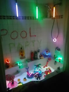 a bathtub filled with lots of toys and lights