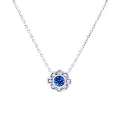 Crafted with milgrain detail and vintage inspiration, this pendant features a blue sapphire weighing 0.20 carats and round brilliant cut diamonds totaling 0.03 carats. Classic Sapphire Diamond Necklace, Classic Blue Diamond Necklace With Accents, Classic Blue Diamond Necklace In Sterling Silver, Elegant Blue Necklace With Pave Setting, Elegant Blue Necklaces With Pave Setting, Diamonds Direct, Vintage Sapphire, Vintage Inspiration, Vintage Pendant