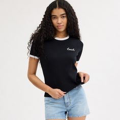 A wardrobe staple this classic-fit cotton T-shirt features our embroidered cursive Coach script. The crewneck is finished with contrast trim. | Coach Ringer T-Shirt - Women's Size XS - Black Contrast Trim, Wardrobe Staples, Top Brands, Hoodie Shirt, Cotton Tshirt, Womens Shirts, Womens Sizes, Crew Neck, Wardrobe