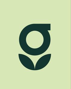 the letter o is made up of leaves and has a green background with black letters