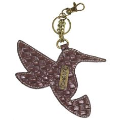 a brown leather keychain with a bird on it