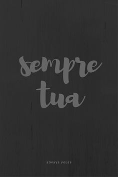 the words sempre tua are written in white ink on a black background