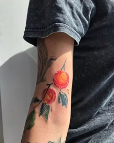 a person with a tattoo on their arm