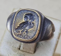 Ring Owl- Ancient Bronze  Vintage-Antique ROMAN RARE -N -19us. 19mm.                                                                        Made in Europe Self designed bronze ring in original Roman style. Rare antique bronze artifact look.  The articles are handcrafted using high quality materials.  The technology used in making the ring does not differ from the original method in Bizantian - Roman times. Size: 19 mm. N-9 5 us. Material: Masive Real Bronze.  If you want express delivery with DH Luxury Antique Bronze Rings, Ancient Rings, Hermes Ring, Recycled Ring, Rustic Rings, Roman Style, Seal Ring, Roman Fashion, Bronze Ring