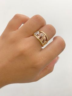 -14k Elephant ring  -100% gold  -Size 7  -Tricolored Gold  -Cubic zirconia  -Item sold by piece. Weight undetermined. Elephant Ring Gold, Elephant Rings, Elephant Necklace Gold, Elephant Ring, Rings Statement, Statement Rings, Cubic Zirconia, Size 7, Jewelry Rings