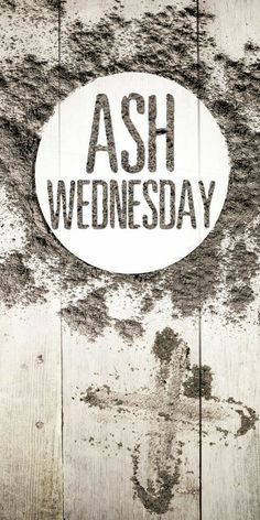 the ash wednesday sign is on top of a wood planked wall with black and white paint