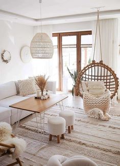 a living room filled with furniture and decor