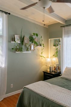 Sage Green Bedroom and Bedding - White accents - Plant Wall - Capiz Shell Lamp - White Ceiling - Wood Flooring Light Green Rooms, Green Room Ideas Bedroom, Light Green Bedrooms, Green And White Bedroom, Sage Bedroom, Green Bedroom Walls, Green Room Decor, Green Accent Walls, Sage Green Bedroom