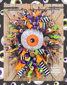 a halloween wreath with an eyeball on it