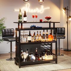 a bar with several bottles and glasses on it