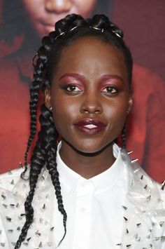 Hair Rings Are The Only Jewelry You Need This Season Hair Rings Hairstyles, New Black Hairstyles, Futuristic Hair, Long Braided Hairstyles, Hairstyles List, Lupita Nyong, Protective Hairstyles For Natural Hair, Top Knot Hairstyles, Lupita Nyong'o