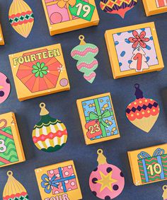 brightly colored wooden christmas ornaments are on display