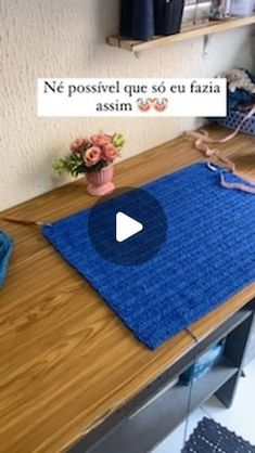 a blue mat sitting on top of a wooden table