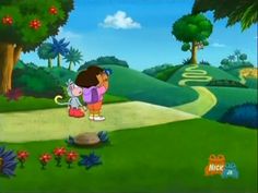 the cartoon dora is playing with her dog in the park, and she's looking at