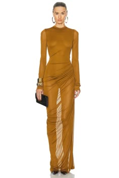 Self: 100% viscose, Lining: 100% cotton.  Made in Italy.  Dry clean only.  Unlined.  Pull-on styling.  Jersey fabric.  Garment is intentionally sheer, undergarments will show through..  .  .  .  .  .  .  .  .  . Classy Edgy, Saint Laurent Dress, Tan Wedding, Dress Aesthetic, Rive Gauche, Gowns With Sleeves, Fashion Industry, Lace Tops, Black Maxi Dress