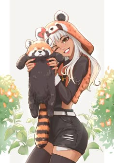 a woman holding a raccoon in her arms