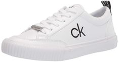 PRICES MAY VARY. With a minimalist inspiration, the Calvin Klein Lariss is made with a lace-up closure, heel logo, a padded insole and a signature rubber outsole. Closed Toe Lace up Closure Essential Fashion, Minimalist Inspiration, Trainers Fashion, Calvin Klein Women, Calvin Klein Woman, Athletic Fashion, Luxury Store, Designer Sneakers, Fashion Sneakers