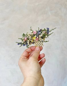 Romantic wedding flower hair comb in meadowy style. The hair comb is made of artificial baby's breath, preserved material and other arranging material. Matching hairpins: https://www.etsy.com/uk/listing/1459802632/colorful-flower-hairpin-romantic-hairpin?transaction_id=3962374247 When stored in dry and dark place, our products last 10-15 years. We can also make you other matching accessories. Please message me for more information. :) ------------------------------------------------------------- Wildflower Hair Comb, Wildflowers In Hair, Hair Fairy, Romantic Bridal Hair, Wedding Hairstyles And Makeup, Fairy Design, Romantic Wedding Flowers, Wedding Bohemian, Bohemian Flower