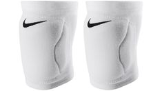 a pair of white knee pads with black nike logo