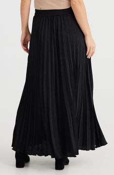 Move gracefully through your day in a pleated A-line maxi skirt topped by a comfortable elastic waist. 37 1/2" length (size Medium) Elastic waist 100% polyester Hand wash, line dry Imported