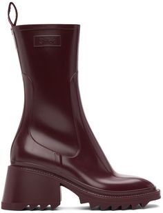 Mid-calf PVC boots in burgundy. Embossed logo at outer side. · Square toe · Pull-loop at heel collar · Zip closure at inner side · Bonded jersey lining in black · Tonal treaded rubber sole · Approx. 2.75 heel Supplier color: Burgundy | Chloé Burgundy Betty Rain Boots Rain Boots Outfit, Designer Rain Boots, Burgundy Background Aesthetic, Pvc Boots, Rain Boot Outfit, Chloe Boots, 2024 Inspiration, Burgundy Background, Chloe Clothing