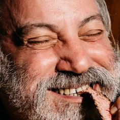 a close up of a person eating food