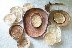 wicker baskets and spoons laid out on the floor