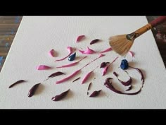 a painting is being made with colored pencils