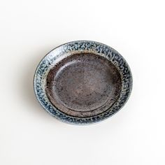 A pasta bowl with a textured glaze in blue, brown, and cream hues, featuring a ridged interior. Japanese Plates, Japanese Curry, Pasta Bowl, Deep Plate, Pasta Bowls, Dessert Plate, Indigo Blue, Folk Art, Stoneware