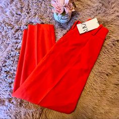 *First Image For Attention* This Super Cute Pair Of Orangy Red Trousers Are Nwt From Zara. They’re Perfect For An Office Day With Heels Or Paired Down With Some Flats Or Boots. In Perfect Condition Size Usa Xs Red Ankle-length Party Pants, Red Ankle-length Pants For Party, Red Pants For Party, Red Zara Pants For Summer, Zara Red Pants For Summer, Zara Red Summer Pants, Zara Red Work Pants, Zara Red Workwear Pants, Zara High-waisted Red Pants