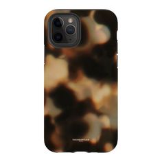 an iphone case with a brown and black pattern on the back, showing it's front camera lens