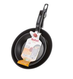 an empty frying pan with a tag on it