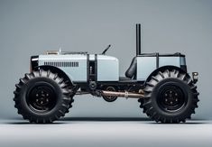 a white tractor with large wheels on a gray background