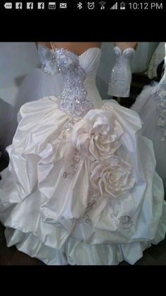 a wedding dress made out of white satin