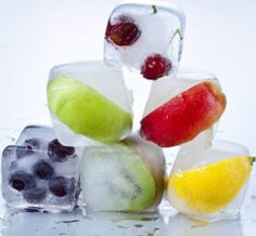 ice cubes filled with fruit and water