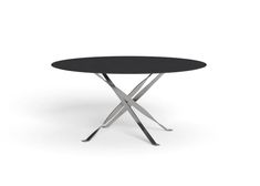 a round table with two crossed legs and a black top on an isolated white background