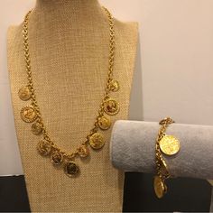 New Without Tags. Necklace And Matching Bracelet - Shiny Gold Tone With Coin Like Charms Dangling. Necklace Has A Lobster Clasp Closure And Measures 18” Plus 2” Extender. Bracelet Has A Toggle Closure And Measures 7”. Really Nice Set! Check Out Other Items In My Closet! Bundle For The Best Discount! Questions? Leave A Comment Below! Inventory No J5050 Gold Coin Necklace With Charms In Brass, Goa Cafe, Luxury Hallmarked Gold Coin Necklace, Gold-tone Coin Necklace With Adjustable Chain, Dangling Necklace, Gold-tone Metal Coin Necklace, Coin Charm Bracelet, Vintage Brass Coin Necklace, Tarnish Resistant, Gold Bracelet Set