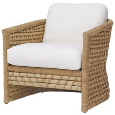 a wicker lounge chair with white cushions