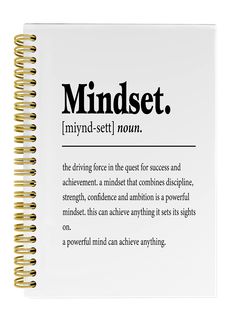 a spiral notebook with the words mindset in black and white writing on top of it