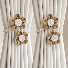 curtains with crocheted flowers on them