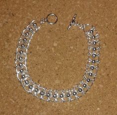 I don't much like bugs and the name given to this simple yet elegant chain maille weave bracelet should be changed in my opinion! Centipedes, Weave Bracelet, Chainmaille Bracelet, Chain Maille, Woven Bracelets, Chain Link Bracelet, Link Bracelets, Chain Link, Bugs