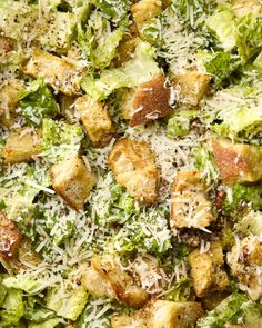 a close up of a plate of food with broccoli and cheese