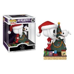 a pop vinyl figurine with a christmas hat on