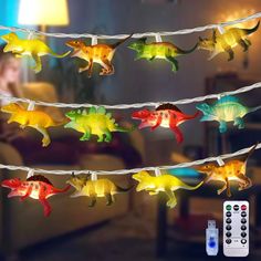 PRICES MAY VARY. 【20 LED Dinosaur Light】9.8FT long dino chain lights with timer and 20 LEDs, it can shines in all directions. The soft light let you and your children feel relaxing and don't cause any harm to the eyes. 【8 Modes Dinosaur String Light 】8 different light modes for your choice: Combination, Wave Flash, Alternating Flash, Breath, Chase, Slow Flash, Flash and Constant Light; Just one button to get your favorite light mode. 【USB Powered 】Designed with a USB plug, enables you to conveni Dinosaur Theme Playroom, Dinosaurs Room Ideas Bedrooms, Dino Bedroom Ideas For Boys, Dinasour Theme Birthday Party, 3rex Birthday Party Boy, Dino Playroom, Two Rex Birthday Party Boy, Boy Dinosaur Room, Dinosaur Room Ideas