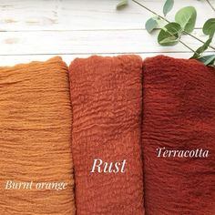 three towels with the names rust, terracotta and terracotta on them